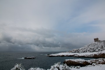Ionian coast after a exceptional snowfall, Salento, Italy