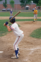 Young batter waiting for pitch