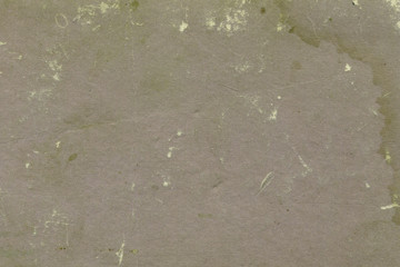 Cardboard green abstract pattern texture close-up. Retro old paper background. Grunge concrete wall. Vintage blank wallpaper.