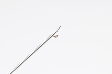 Syringe and needle isolated on white background.Copy space