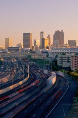 Obraz premium Rush hour traffic with Atlanta beyond