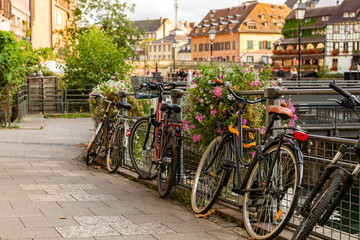 Bikes at Petite France bridges in Strasbourg - obrazy, fototapety, plakaty