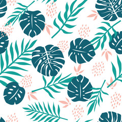 Vector seamless pattern with tropical palm leaves. Graphic stylized drawing.