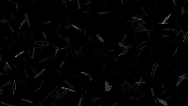 Abstract shattered sharp broken glass shard pieces on a black abstract textured background representing destruction and crime