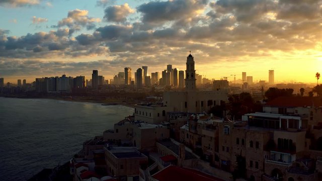 Old city Jaffa and Tel Aviv in Israel, morning sunrise 4k aerial drone skyline