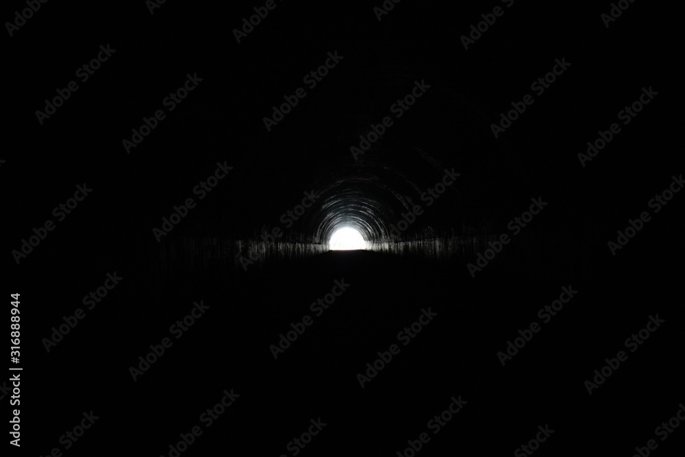 Wall mural light at the end of the tunnel