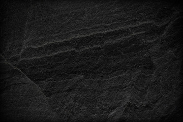 Dark grey black slate background or texture.