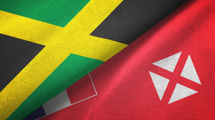 Jamaica and Wallis and Futuna two flags textile cloth, fabric texture