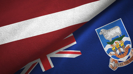 Fototapeta premium Latvia and Falkland Islands two flags textile cloth, fabric texture