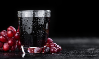 Red Grape Juice (selective focus; detailed close-up shot)