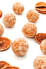 Orange sweets. Raw handmade sweets. Healthy low-calorie sweets for vegetarians.