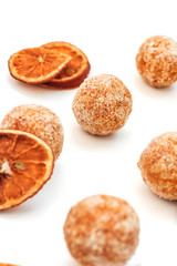 Orange sweets. Raw handmade sweets. Healthy low-calorie sweets for vegetarians.