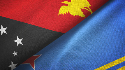 Papua New Guinea and Aruba two flags textile cloth, fabric texture