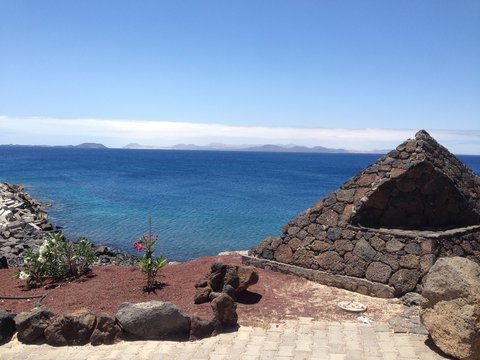 Papagayo Beach In The Lanzarote Island With Mountains On The Background On The Canary Islands