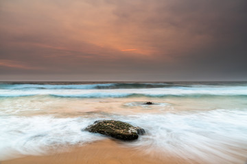 Sunrise Seascape and Hazy Sky with High Clouds