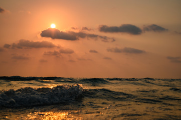 Fototapeta na wymiar Beautiful sunset above sea.
