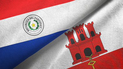 Paraguay and Gibraltar two flags textile cloth, fabric texture