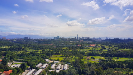 Naklejka premium Blue color sky over green landscape at Kuala Lumpur, Malaysia