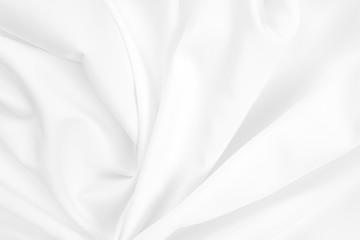 Naklejka na ściany i meble Abstract white fabric texture background. Cloth soft wave. Creases of satin, silk, and cotton.