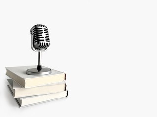 Retro microphone stand on books. Podcast and audio book concept on light gray background.