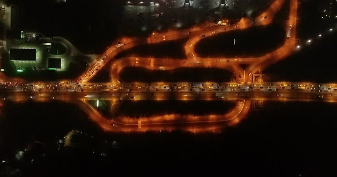4K Aerial Top Drone View: Accident and traffic jam on the bridge in the evening after a working day. A huge number of cars on the road at rush hour. Downtown, city central part. Dnipro, Ukraine