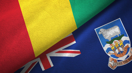 Fototapeta premium Guinea and Falkland Islands two flags textile cloth, fabric texture