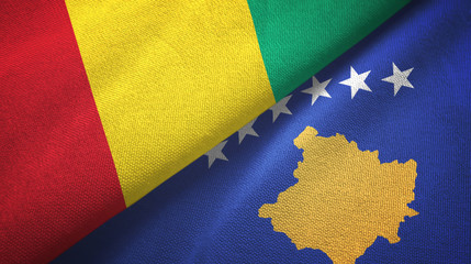 Guinea and Kosovo two flags textile cloth, fabric texture