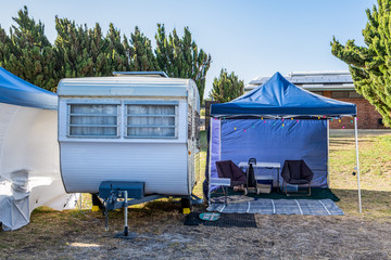 Vintage caravan and gazebo tent at a holiday park in Australia