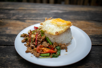 Rice topped with stir-fried beef and basil