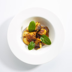 Roasted Boletus or Porcini Mushrooms with Baked Potatoes Isolated
