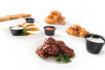 Buffalo Wings with other Appetizers on white