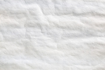 Grey mixed with yellow crumpled background paper texture