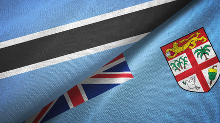 Botswana and Fiji two flags textile cloth, fabric texture
