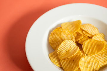 Potato chips on a dish