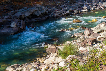 Clean mountain river in the autumn forest.