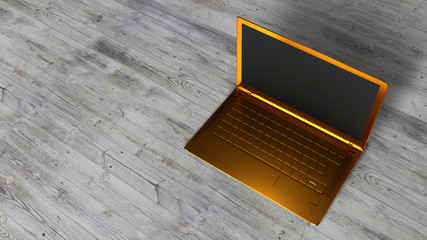 A gold laptop on an empty gray wooden table. The view from the top. 3D Rendering