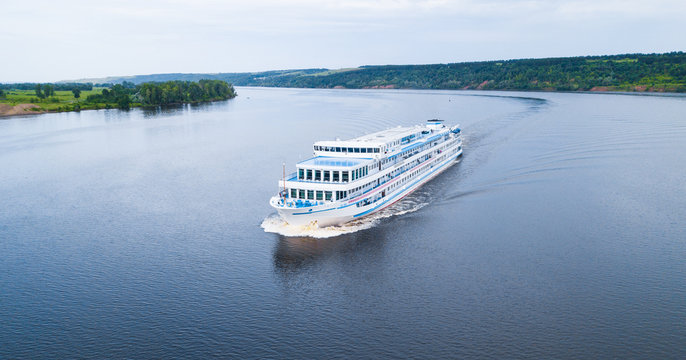 Cruise boat moves along the river of Kama. Russia
