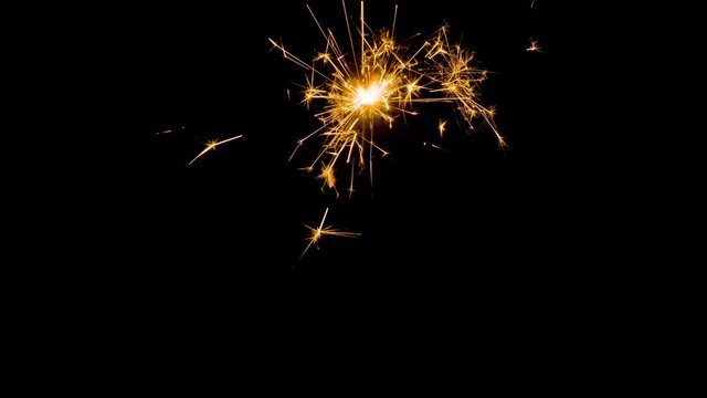  Abstract background closes up to sparking firework on dark background, particle firework for decorating celebrate event, birthday and new year concept. dark frame for effect mapping screen mode.