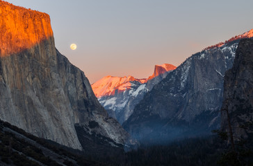 Yosemite national park at sunset with a full moon