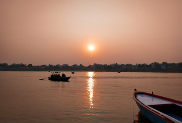 Fototapeta na wymiar Sunset at the banks of river Ganga
