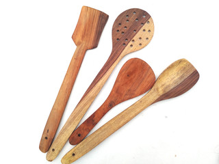 some wooden spatula isolated on white background