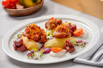 Grilled chicken, meat with vegetables and potatoes