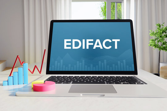 EDIFACT – Business/Statistik. Laptop im Büro mit Begriff auf dem Monitor. Finanzen/Wirtschaft.