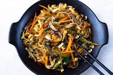 Stir fried Korean glass noodle with soy sauce called Japchae