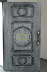 Door with David 's star in synagogue premises