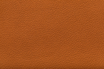 brown leather texture useful as orange background for design. High resolution photo
