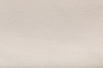 Beige leather texture used as background. High resolution photo