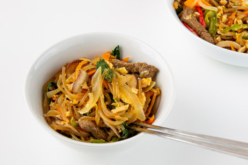Stir fried Korean glass noodle with soy sauce called Japchae