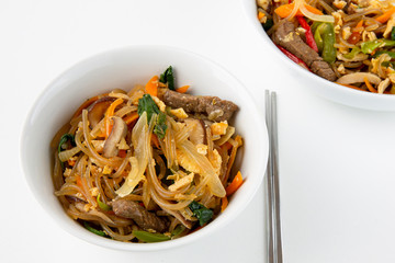 Stir fried Korean glass noodle with soy sauce called Japchae