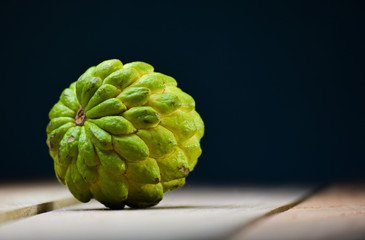 Fresh Custard Apple on wooden table background